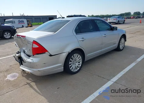 2012 Ford Fusion Hybrid из США, поврежденный, VIN 3FADP0L31CR173930